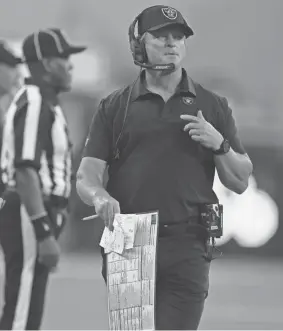  ?? KIRBY LEE/USA TODAY SPORTS ?? Former Raiders coach Jon Gruden looks on during a game against the Chargers on Oct. 4 in Inglewood, Calif.