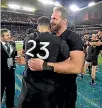  ??  ?? Kieran Read and the relieved All Blacks celebrate their one-point win in Cape Town.