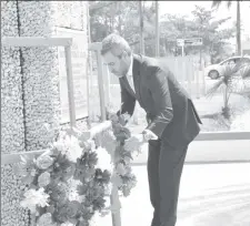  ?? (Ministry of the Presidency photo) ?? Non-Resident High Commission­er of the Republic of Cyprus to Guyana, Haralambos Kafkarides laying a wreath at the Independen­ce Arch on Brickdam.