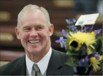  ?? ASSOCIATED PRESS ?? State House Speaker Mike Turzai, R-Allegheny, behind the “Down Syndrome Protection Act.” smiles in this 2015 photo. He’s the man