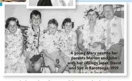  ?? ?? A young Mary next to her parents Marion and John with her siblings Janet, David and Syd in Rarotonga, 1959.