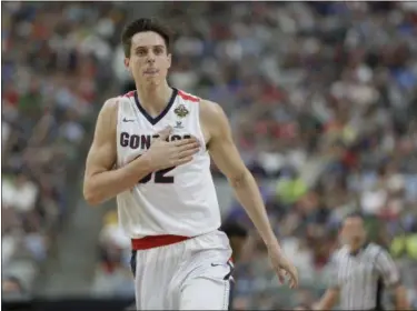  ?? MARK HUMPHREY — THE ASSOCIATED PRESS ?? Gonzaga’s Zach Collins celebrates during the first half of the Bulldogs’ victory over South Carolina on April 1.