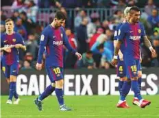  ?? Reuters ?? Barcelona’s Lionel Messi looks dejected after the match against Getafe at Camp Nou on Sunday. The La Liga leaders were held to a goalless draw.