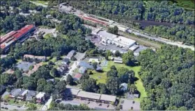  ?? SCREENSHOT FROM GOOGLE EARTH ?? UniTech’s Royersford facility, the white building against the railroad tracks, is located at 401N. Third Ave.