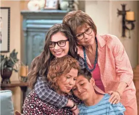  ?? ADAM ROSE/NETFLIX ?? Netflix’s reboot of “One Day at a Time,” starring Justina Machado, center, Isabella Gomez, Rita Moreno and Marcel Ruiz, is like a hug from your TV.