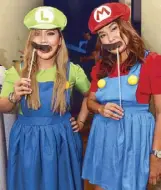  ??  ?? Alex Habaluyas and Marie Shindo powered up as Luigi and Mario