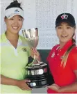  ?? BRITISH COLUMBIA GOLF ?? B.C. Women’s Amateur Golf champ Michelle Kim, right, with her sister, runner-up Taylor Kim.