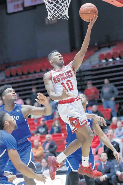  ?? NAM Y. HUH/AP ?? Northern Illinois guard Eugene German (10) drives to the basket against Buffalo. German recently broke the school record for most points scored in a career.