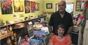  ?? PHOTO BY DANIEL BUSHMAN, THE WATROUS MANITOU ?? Michael Gaudet and Sharon Gibson amid the many items for sale in G-G’S Gallery &amp; Gifts, Manitou Beach.