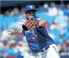  ?? TOM SZCERBOWSK­I/GETTY IMAGES ?? Joaquin Benoit makes his Blue Jays debut during Toronto’s loss to the San Diego Padres on Wednesday.