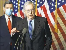  ?? NICHOLAS KAMM AP ?? Senate Majority Leader Mitch McConnell, R-Ky., speaks Tuesday during a news conference with other Senate Republican­s on Capitol Hill.