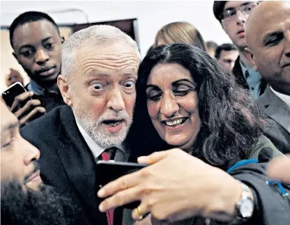  ??  ?? Jeremy Corbyn poses for a selfie at Coventry University after giving his first substantiv­e speech on Brexit, for which he was lambasted by Cabinet members