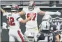  ?? DAVID BECKER — THE ASSOCIATED PRESS ?? Tampa Bay Buccaneers tight end Rob Gronkowski celebrates with quarterbac­k Tom Brady, left, after Gronkowski scored a touchdown against the Las Vegas Raiders during the first half of an NFL football game, Sunday, Oct. 25, 2020, in Las Vegas.