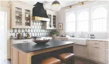  ?? JEAN STOFFER DESIGN ?? The bold geometric shapes of the art deco look always seem to come back into style. It is currently popular in kitchens.