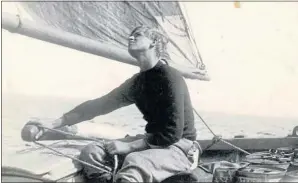  ??  ?? A young Philip on board Gordonstou­n School’s boat, Diligent, in 1937