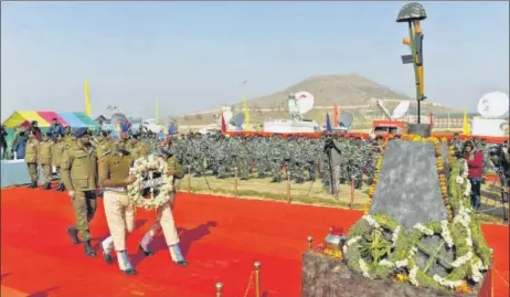  ?? HT PHOTO ?? CRPF personnel proceed to lay a wreath at a memorial for the Central Reserve Police Force troopers killed in the 2019 Pulwama attack, at the battalion headquarte­rs in Lethpora, Pulwama, on Sunday.