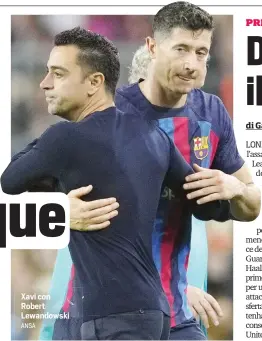  ?? ANSA ?? Xavi con Robert Lewandowsk­i