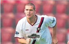  ??  ?? Lee Wilkie during his early years at Dens.