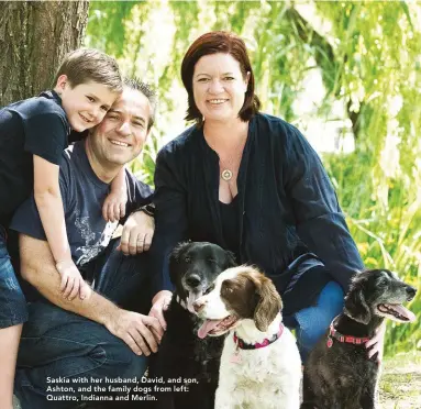  ??  ?? Saskia with her husband, David, and son, Ashton, and the family dogs from left: Quattro, Indianna and Merlin.