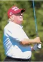  ?? WIN MCNAMEE/GETTY ?? Former President Trump golfs Tuesday in Virginia. His Florida estate was searched Aug. 8.
