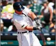  ?? AP/PAUL SANCYA ?? Former Arkansas Razorbacks catcher James McCann’s grand slam for the Detroit Tigers in Monday’s victory over the Los Angeles Angels took on a special significan­ce.