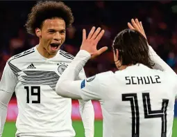  ?? TF-IMAGES ?? Triumph: Sane hails Nico Schulz’s winning goal