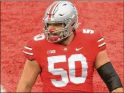  ?? DAVID JABLONSKI / STAFF ?? Josh Myers, a Miamisburg High School graduate who started two years at center for Ohio State, is getting a chance to audition for the NFL.