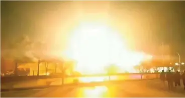  ?? (AFP) ?? This image grab taken from a UGC video posted on Sunday shows an explosion in Iran’s Isfahan province