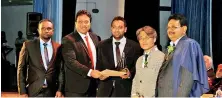  ??  ?? World of Outdoor receiving the Excellence Award at SLIA Architect 2017. From left: Farshad Farook- Production Manager, Jehan Noor- Brand Manager, Razeen Mahroofhea­d of Operations, Archt. Gibson Rhie- Korea based Samoo Architects and SLIA Senior VP...