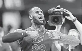  ?? [TONY DEJAK/THE ASSOCIATED PRESS] ?? Cleveland Cavaliers’ LeBron James celebrates after scoring the game-winning shot in the second half of Game 5 of an NBA first-round playoff series against the Indiana Pacers on Wednesday in Cleveland.