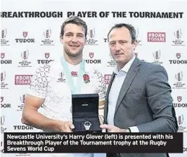  ??  ?? Newcastle University’s Harry Glover (left) is presented with his Breakthrou­gh Player of the Tournament trophy at the Rugby Sevens World Cup