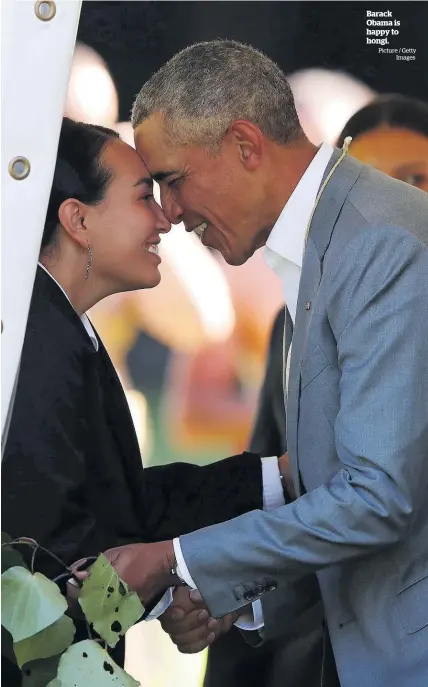  ?? Picture / Getty Images ?? Barack Obama is happy to hongi.