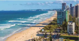  ??  ?? This page from above: Gold Coast Convention and Exhibition Centre; and the Surfers Paradise coastline Opposite: Sun, surf and a city skyline