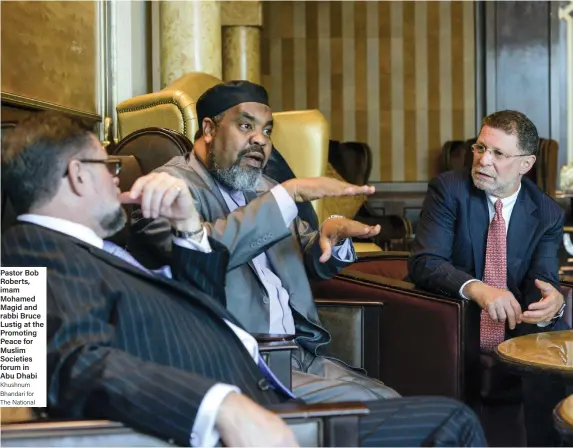  ?? Khushnum Bhandari for The National ?? Pastor Bob Roberts, imam Mohamed Magid and rabbi Bruce Lustig at the Promoting Peace for Muslim Societies forum in Abu Dhabi