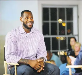  ?? Bob Luckey / Hearst Connecticu­t Media ?? Basketball superstar LeBron James announcing that he will play for the Miami Heat during a news conference in 2010 at the Boys & Girls Club of Greenwich.