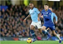  ?? AP ?? Sterling received a barrage of abuse from home supporters as he retrieved the ball from behind the goal during the first half —