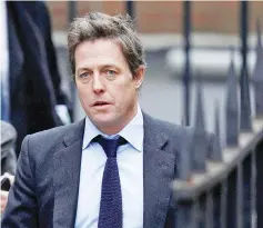  ??  ?? British actor Hugh Grant arrives at the Leveson Inquiry at the High Court in central London, Britain Nov 21, 2011. — Reuters file photo