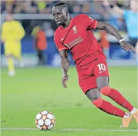  ?? | DOMENECH CASTELLO EPA ?? SADIO Mane scored one of the three goals for Liverpool against Villarreal.