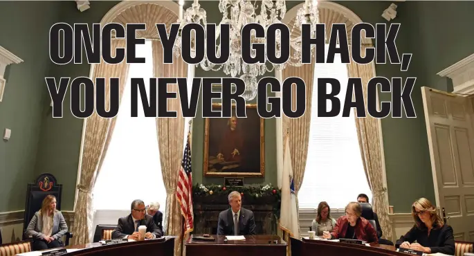  ?? Herald staFF File ?? IN SESSION: Gov. Charlie Baker, center, presides over a Governor’s Council meeting.