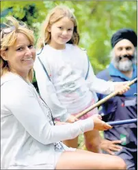  ?? Photos by Toby Van de Velde ?? n CASTING OFF: Families enjoy a day out catching fish