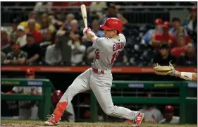  ?? AP/GENE J. PUSKAR ?? St. Louis Cardinals’ Tommy Edman follows through on a solo home run off Pittsburgh Pirates relief pitcher Richard Rodriguez during the seventh inning Friday.