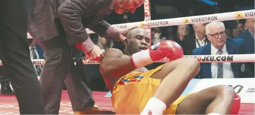  ??  ?? Adonis Stevenson a été battu par K.-O. samedi soir à Québec. Il est maintenant dans le coma. - La Presse canadienne: Jacques Boissinot