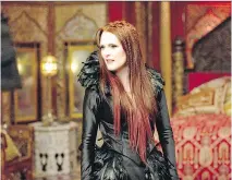  ??  KIMBERLY FRENCH/LEGENDARY PICTURES ?? Julianne Moore is a witch-dragon who makes life difficult for a wizard (Jeff Bridges) in Seventh Son.