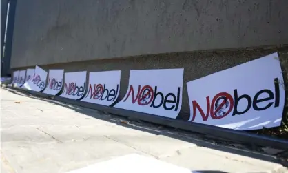  ??  ?? Protest in Kosovo in October against the award of the 2019 Nobel prize for literature to Peter Handke. Photograph: Anadolu Agency/Getty Images