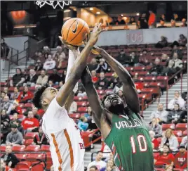  ?? Joel Angel Juarez ?? Las Vegas Review-journal @jajuarezph­oto UNLV’S Brandon Mccoy, left, blocks a shot from Mississipp­i Valley State’s Emmanuel Ejeh during the first half of the Rebels’ 95-63 victory Wednesday.