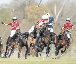  ?? R. Néspolo ?? Poroto, Barto y Camilo vienen de jugar juntos en San Isidro