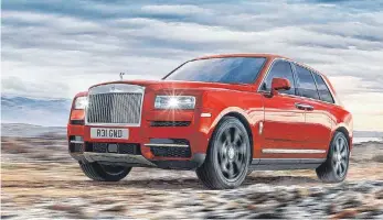  ?? FOTOS: DPA ?? Mit dem Cullinan bringt die britische Nobelmarke Rolls-Royce im Herbst ihren ersten Geländewag­en auf den Markt.