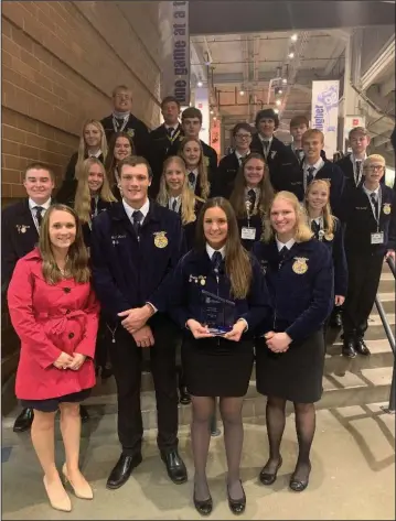  ?? Photo provided ?? Members of the New Bremen FFA Chapter who attended the 2021 National Convention along with the chapter’s Model of Excellence Award.