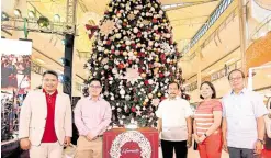  ?? ?? At the tree lighting ceremony of Lifemalls by Filinvest: (from left) Tristan Las Marias, Filinvest Land Inc. (FLI) president; Francis Gotianun, FLI director; Muntinlupa Vice Mayor Artemio Simundac; Josephine G. Yap, FLI chief executive officer; former ambassador to Singapore Joseph M. Yap