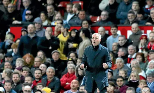  ?? AP ?? Under-fire manager Jose Mourinho urges on the Manchester United players during their dramatic 3-2 win over Newcastle.